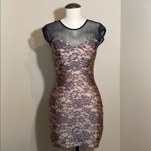 Tight lace pattern dress.